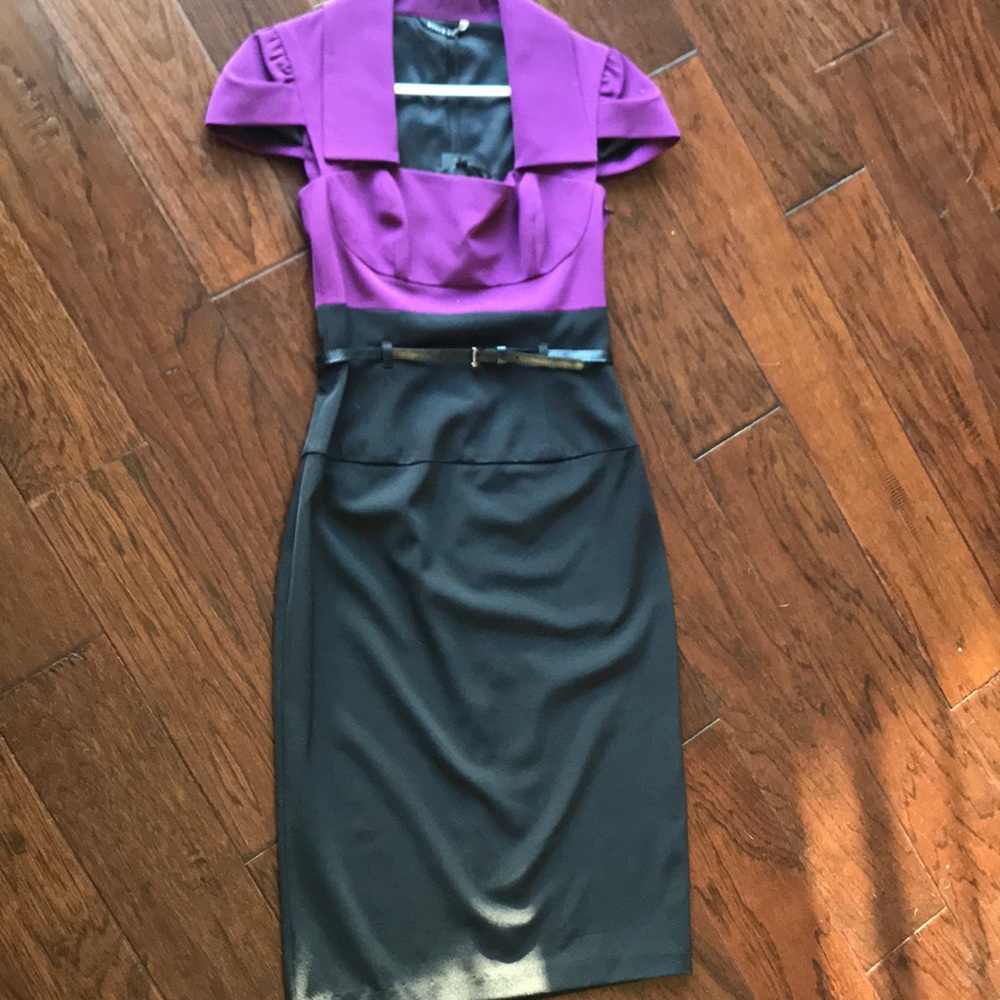 Square neck dress with belt.